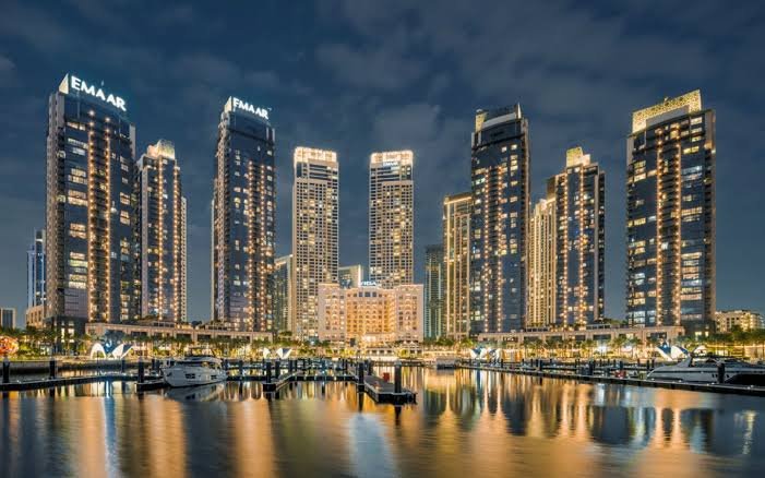 Dubai Creek Harbour towers and marina at dusk